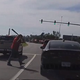 Scene from a video of a Nov. 11, 2016, incident showing a man police say is 18-year-old Travis Thompson threatening motorists with a baseball bat
Facebook